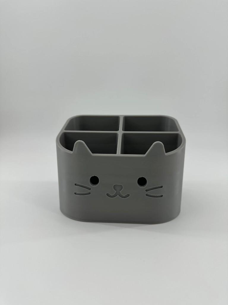 Cat-face four-compartment desk organizer