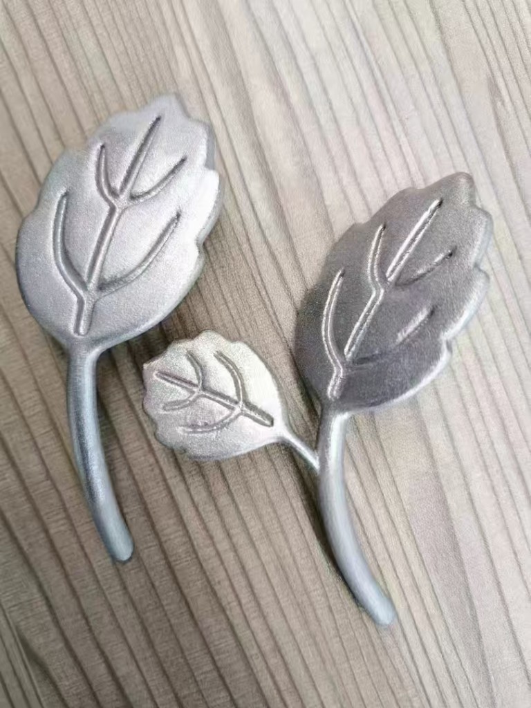 Pair of metal 3D printed decorative leaves