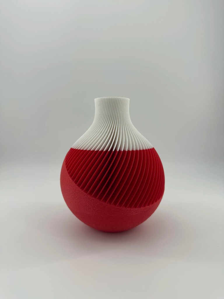 Two-tone red and white spiral fin vase