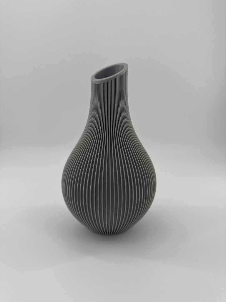Vertically ribbed grey parametric vase