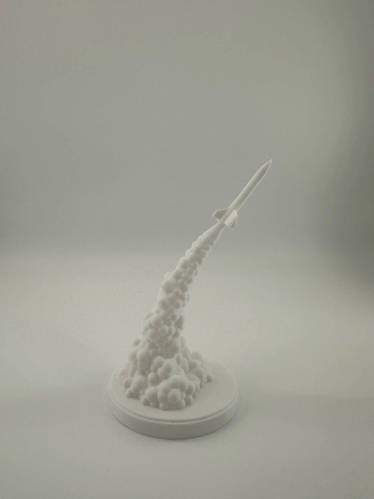 White rocket with smoke plume base